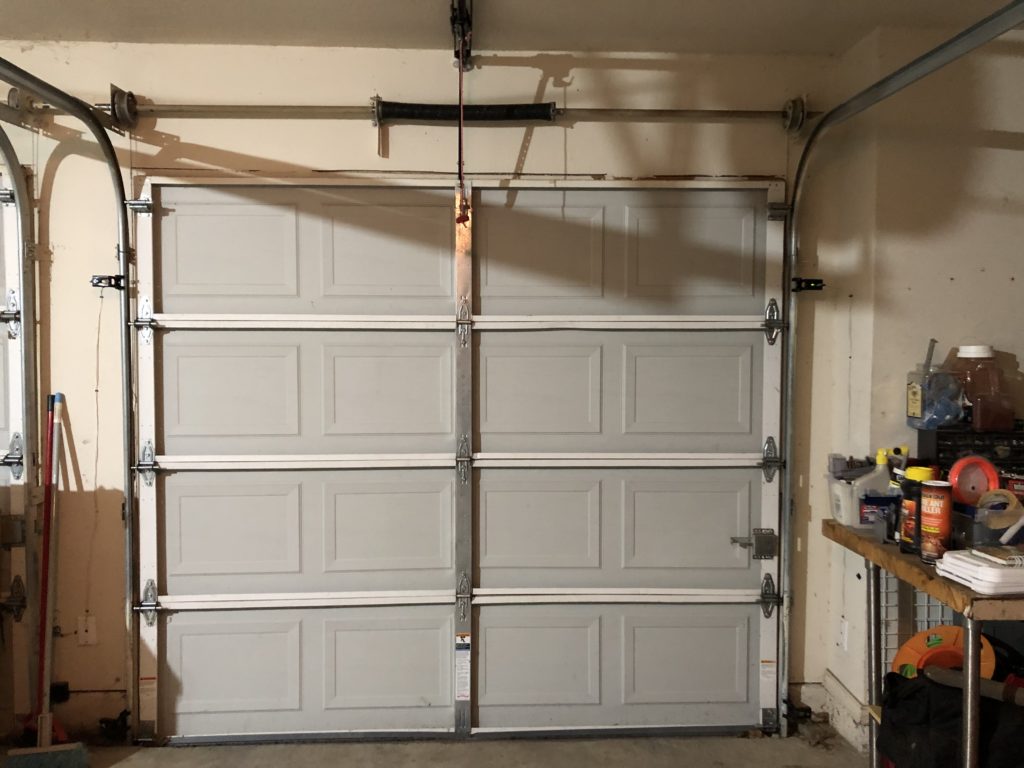 garage door spring repair Plano TX
