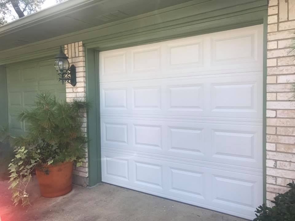 Traditional White Recessed Short Panel Garage Door