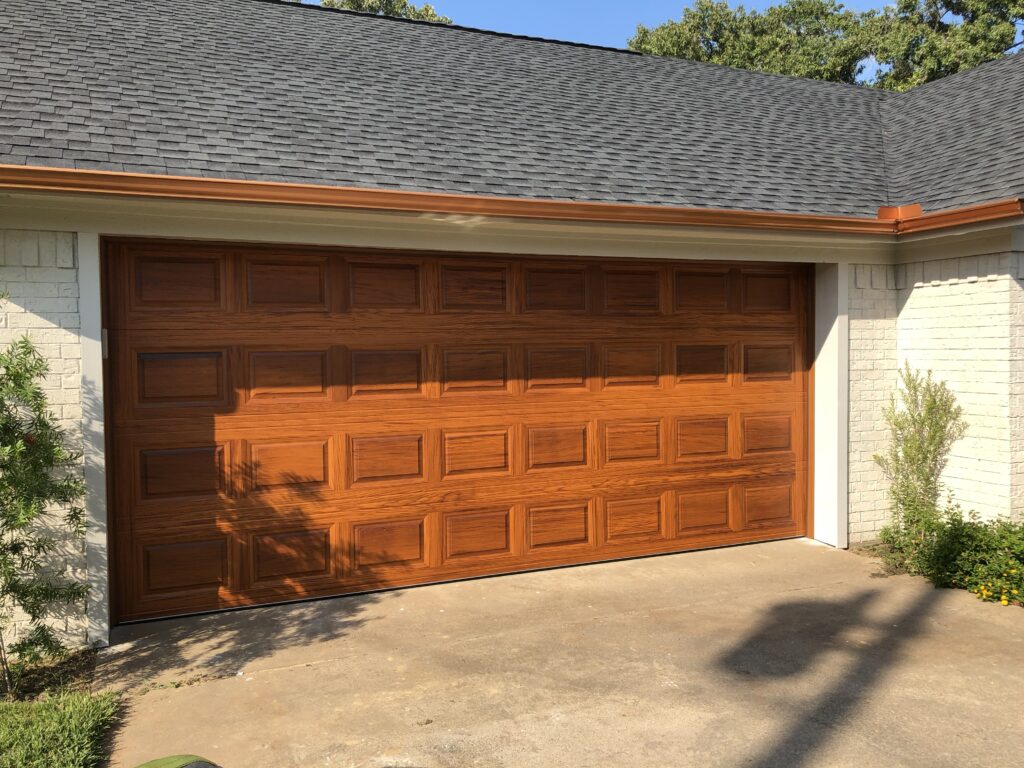 new wood garage door installation completed by local garage door company